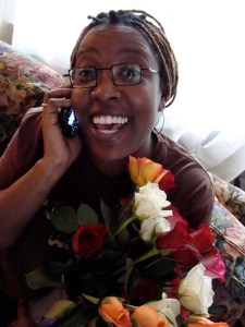 Deesha Philyaw with Mother's Day Roses and Her Cell Phone